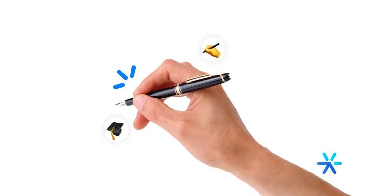 Mão escrevendo em superfície branca com caneta, rodeado de dois emojis. 