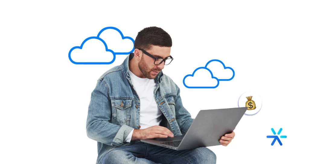 Homem usando computador ao lado de ícones de nuvem. 
